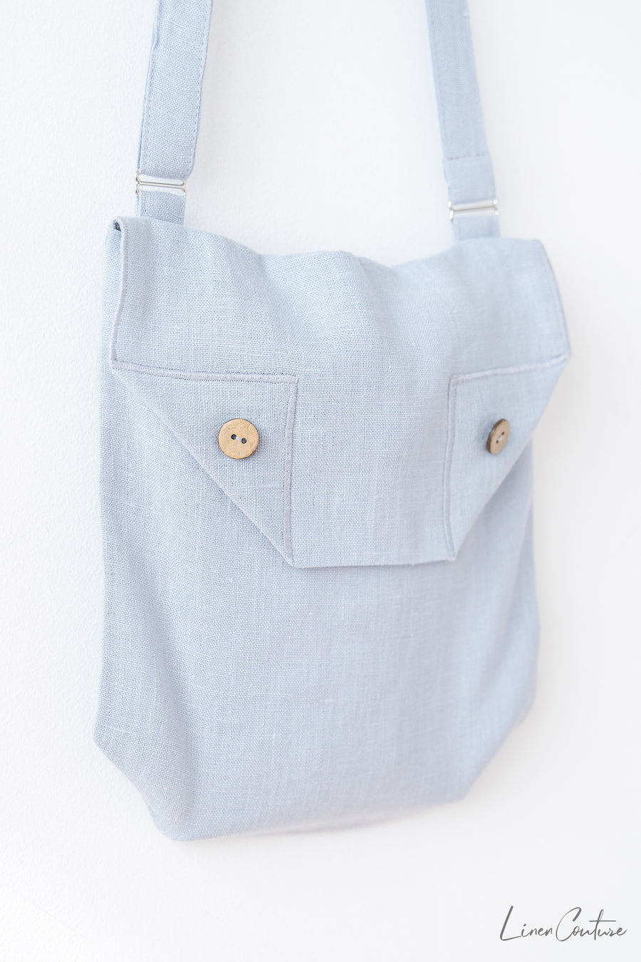 Ice Blue Linen Shoulder Bag with Coconut Buttons and Adjustable Strap - Linen Couture Boutique