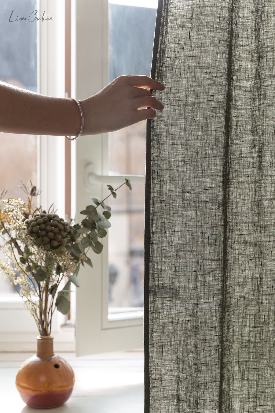 Linen curtain with pleating tape and crown in Safari greenLinen Couture