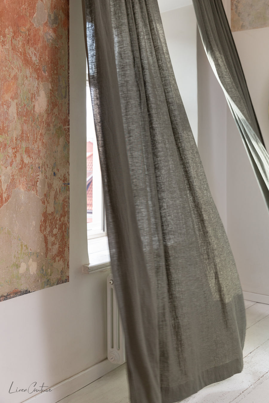 Linen curtain with pleating tape and crown in Safari greenLinen Couture