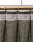 Linen curtain with pleating tape and crown in Safari greenLinen Couture